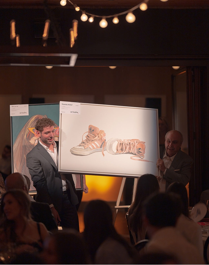 Artwork on easel at charity event